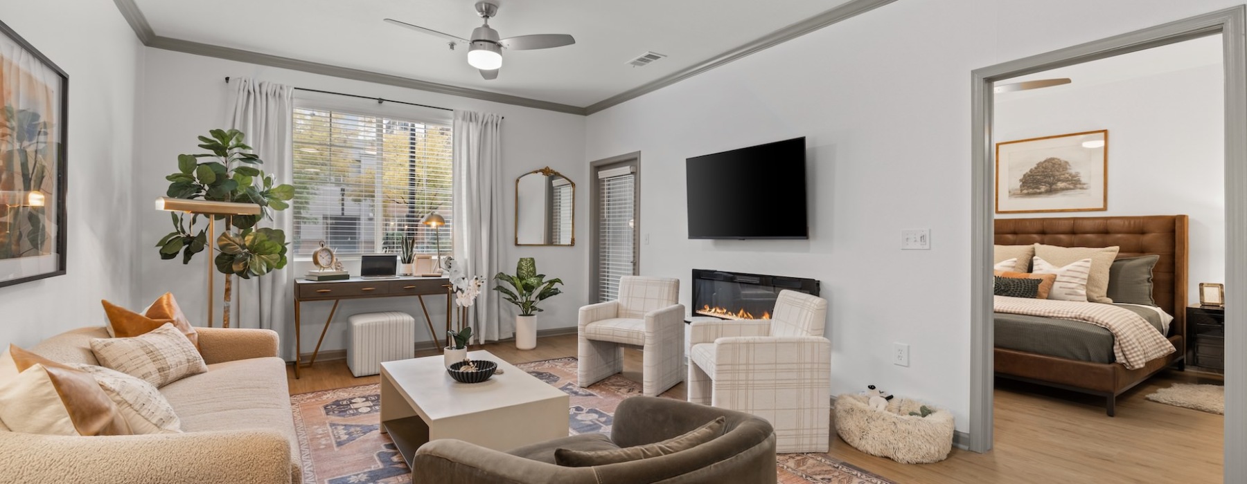 spacious living room and dining area full of natural lighting